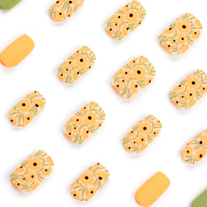 Short square floral press-on nails with sunflower patterns in yellow and green