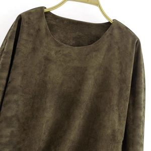 Brown suede long sleeve top with crew neck and gathered waist detail on white background