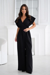 Detail of elegant black V-neck jumpsuit showing smooth fabric texture and belted waist