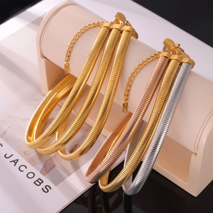 Multi-layered gold silver and rose gold snake bone chain necklace in punk style