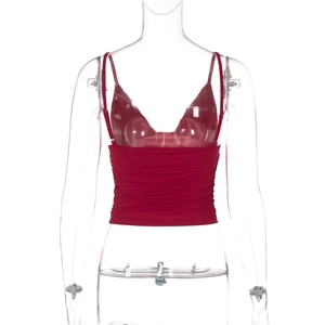 Detailed front view of red V-neck crop top with ribbed texture on transparent mannequin