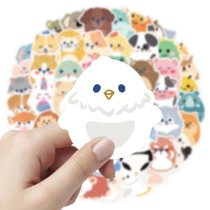 Close-up of a cute white bird cartoon sticker for journals and water bottle decoration