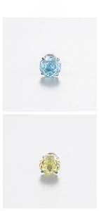 Detailed close-up of 6mm millennium rose cut zircon studs with secure 4-claw titanium setting