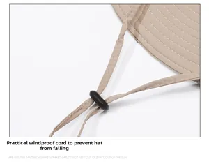 Detail of adjustable chin strap and precision stitching on khaki outdoor sun hat