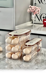 Detail of multi-layer egg storage box with date tracker dial and auto-rolling slide design