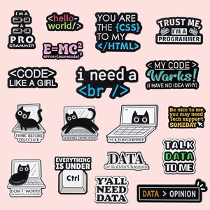 Creative programmer enamel pins with cartoon cats and keyboard designs on pink background
