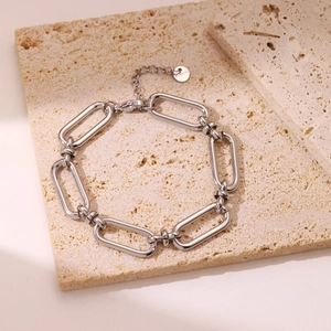 Minimalist silver stainless steel paperclip chain bracelet with adjustable link and charm