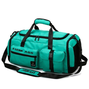 Turquoise large capacity sports gym bag with wet dry separation and shoulder strap