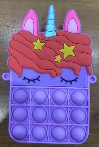 Macro detail of purple unicorn pop fidget toy bag with colorful silicone bubbles