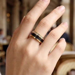 Detailed view of women titanium steel ring with black carbon fiber and sparkling cubic zirconia