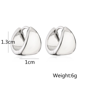 Detail view of 1.3cm x 1cm silver polished hoop earrings with dimension specifications