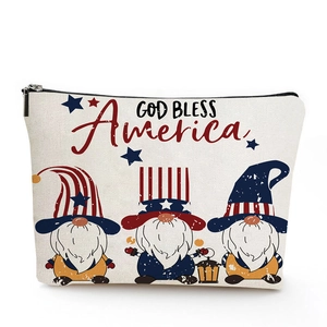 Detailed shot of canvas makeup bag with God Bless America patriotic design