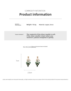 Detailed view of long green zircon tassel earrings with dimensions 7cm by 2.5cm