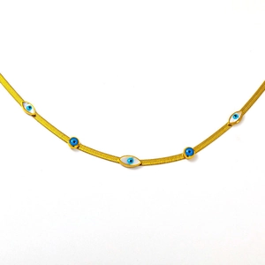 Golden snake chain necklace with Evil Eye and white shell charms on white background