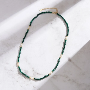 Elegant malachite and freshwater pearl necklace with gold beads and lobster clasp