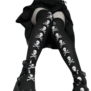 Gothic black over-the-knee socks featuring white skull and crossbones print design