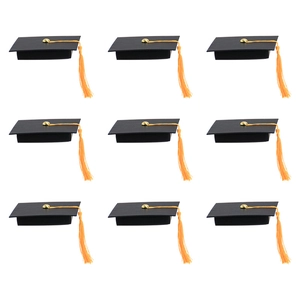 Nine-piece set of creative black graduation cap gift boxes with gold tassels on white background