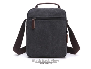 Rear view of dark grey canvas crossbody bag showing durable texture and zipper pocket