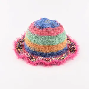 Colorful oil painting style gradient knit bucket hat with pink faux fur trim for women