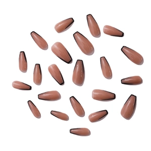 Minimalist long coffin false nails in nude pink with elegant black outline finish
