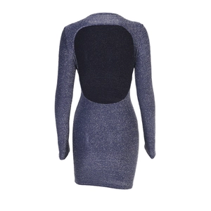 Detail view of the backless design and glittery fabric texture on this navy blue dress