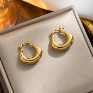 Polished 18k gold plated stainless steel U-shaped hoop earrings in jewelry box