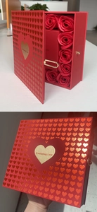 Macro view of red heart-textured gift box with golden Everlasting Love engraving