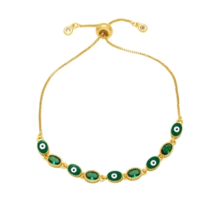 Gold Evil Eye bracelet with green stones and adjustable chain on white background