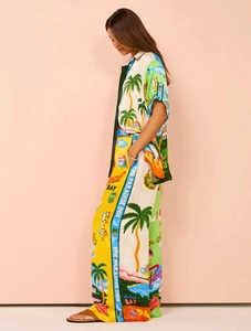 Detail of tropical print two-piece leisure set with short sleeve shirt and wide leg pants
