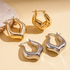 Polished hollow heart earrings in gold and silver finish with sleek U-shaped metal design