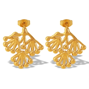 Artistic golden pine branch stud earrings with round bead details on a clean white background