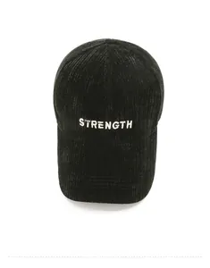 Top view of black corduroy baseball cap with white STRENGTH 3D embroidery detail