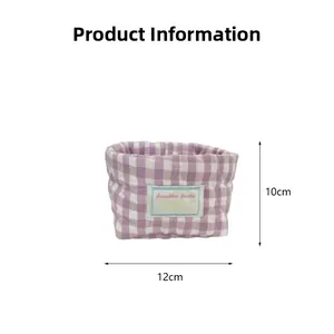 Detailed view of a purple checkered quilted cotton storage basket with dimensions 12x10cm