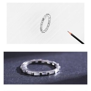 Dettaglio dell'anello eternity in argento con zirconi rettangolari e bozzetto design