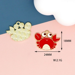 Detailed macro view of a red enamel crab pendant with precise dimensions 18mm by 24mm