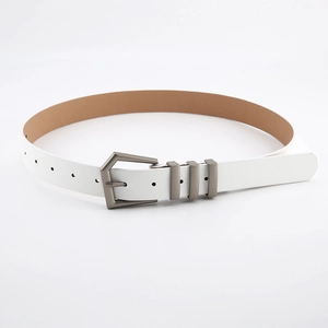 Detail view of white leather belt with unique grey geometric buckle and metal loops