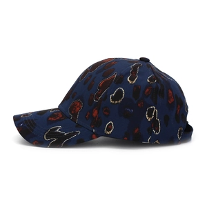 Detail of navy baseball cap with red leopard print and golden glitter accents