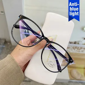 Lunettes anti-lumière bleue à monture noire oversize avec un design rond vintage pour femmes