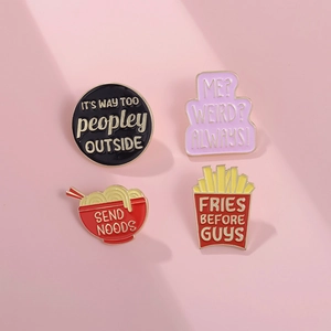 Funny enamel pin set with creative fries and ramen designs on pink background