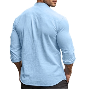 Rear view of light blue cotton linen shirt showing slim fit cut and fabric texture