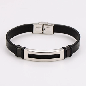 Macro detail of men's leather bracelet with stainless steel clasp and hollow rectangle design
