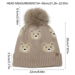 Größentabelle für Kinder Strickmütze mit Bärenmuster und Bommel zeigt Maße in cm