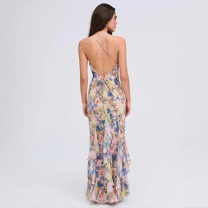 Floral spaghetti strap maxi dress with backless criss-cross detail and tiered ruffled hem