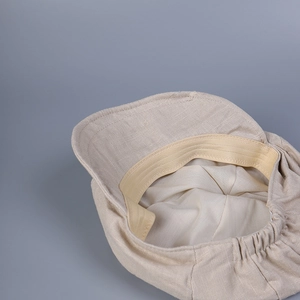 Detail of linen baseball cap interior with moisture-wicking sweatband and elastic strap