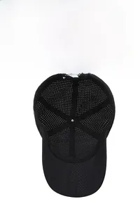 Inside view of black perforated baseball cap showing breathable mesh and adjustable buckle