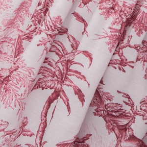 Détail macro du motif de palmier imprimé à l'encre sur la robe à manches lanternes