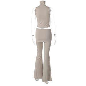 Rear view of beige 3-piece set with sleeveless mock neck top, mini skirt and flared pants