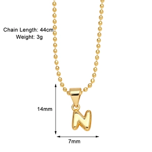 Detail view of gold letter N pendant necklace showing 44cm chain length and 3g weight