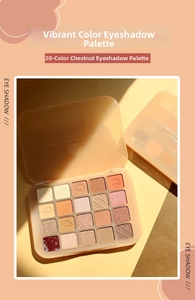 Detailed macro view of 20-color eyeshadow palette with matte and shimmer pressed powders