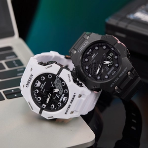 Dual display digital analog sports watch with silicone strap and 50m water resistance